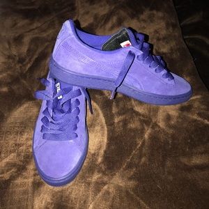 Purple suede pumas